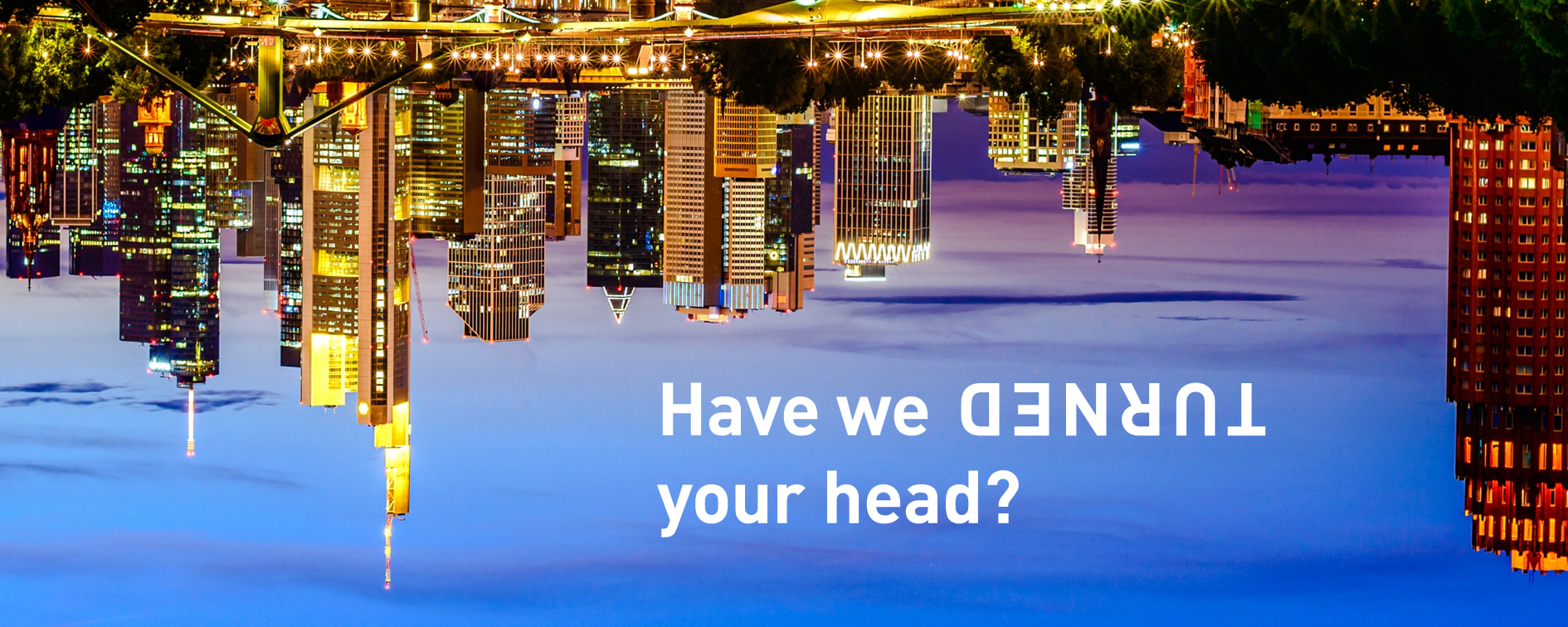 Frankfurt's skyline at night, upside down: Have we turned your head?